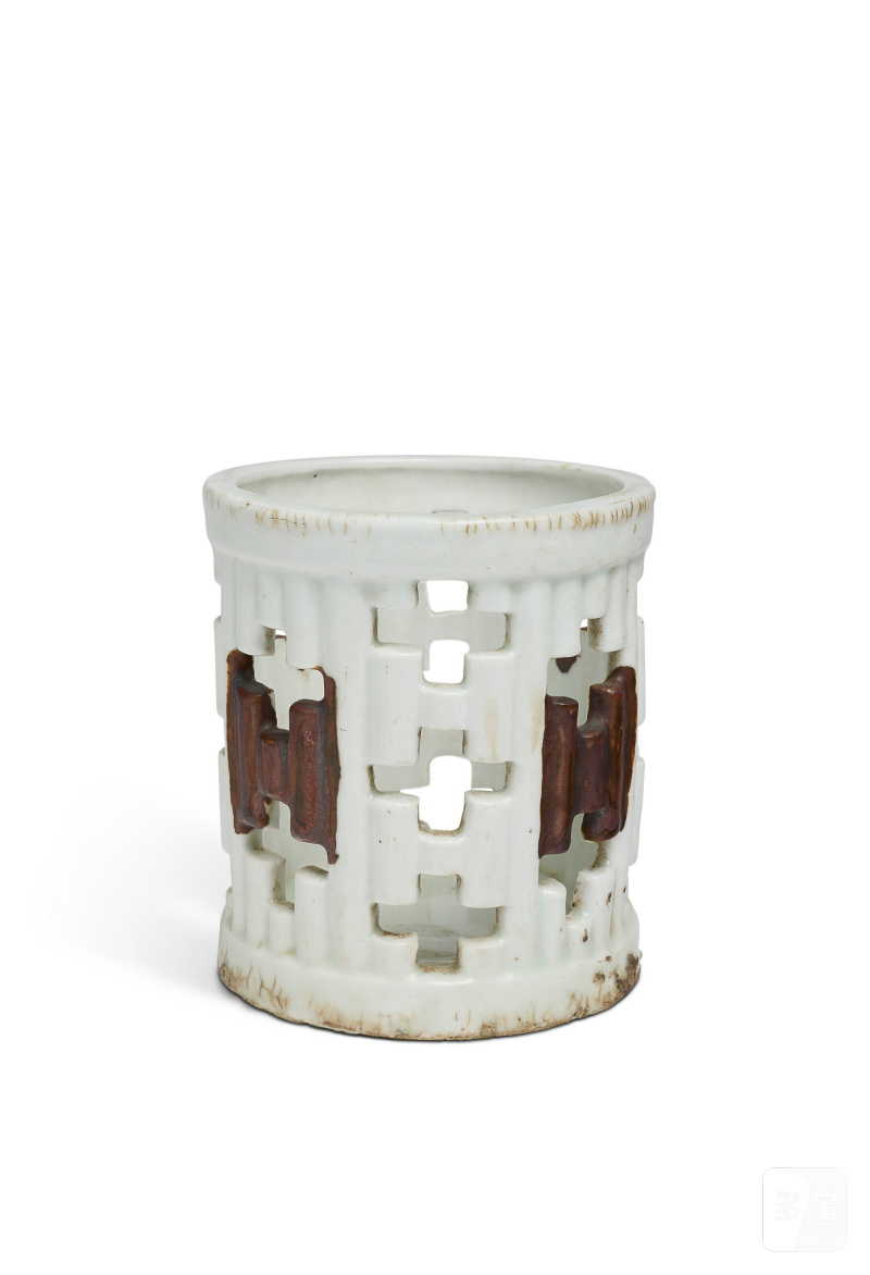 AN IRON-DECORATED WHITE-GLAZED OPENWORK BRUSH POT  KOREA, JOSEON DYNASTY, 19TH CENTURY